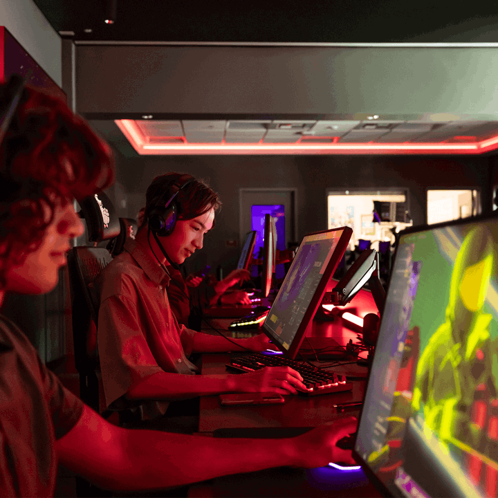 A group of Esports student team members playing a team match.